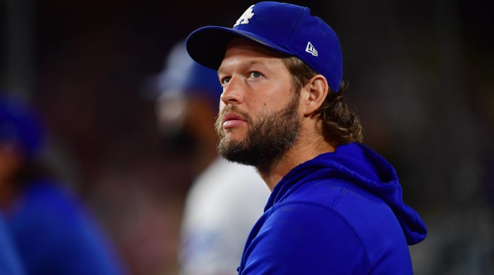 Dodgers starting pitcher Clayton Kershaw looks up while in the dugout during a game.